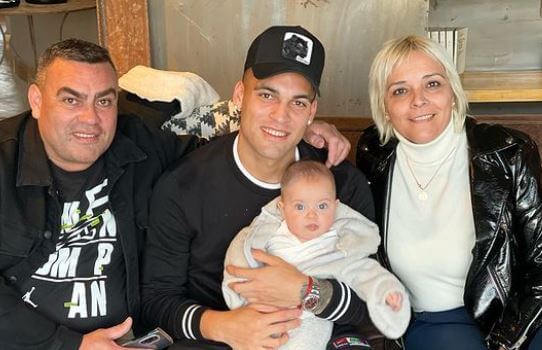 Karina Vanesa Gutierrez and husband Mario Martinez with their son Lautaro Martinez and grandchild.